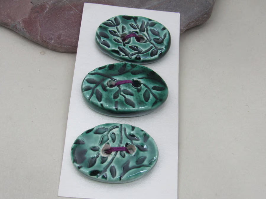 Trio of Medium Oval Sprig Pattern Ceramic Buttons