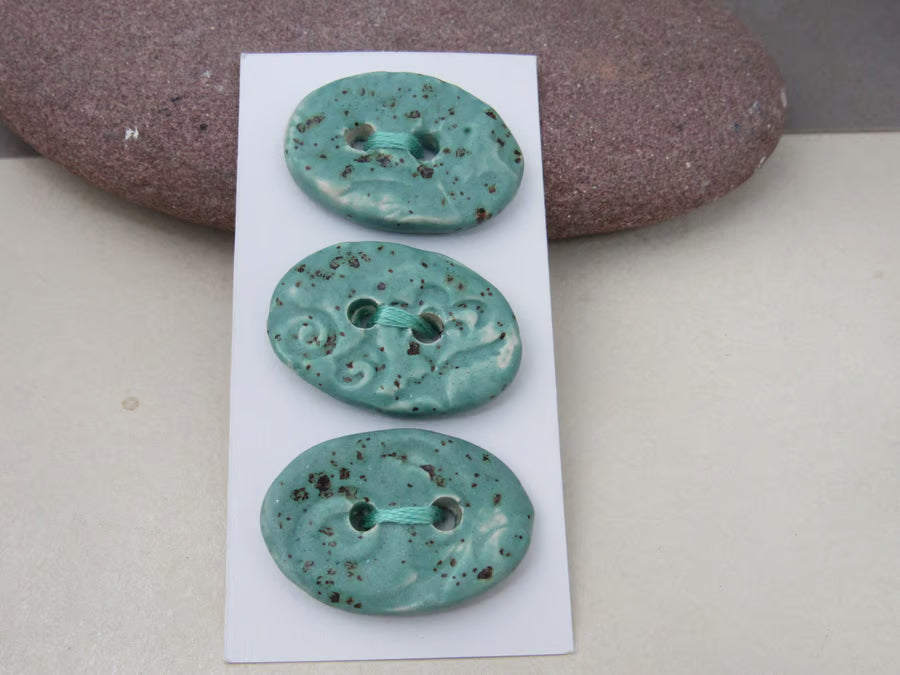 Trio of Medium Oval Brocade Pattern Buttons