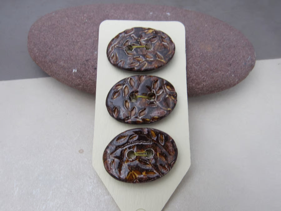 Trio of Medium Oval Sprig Pattern Ceramic Buttons