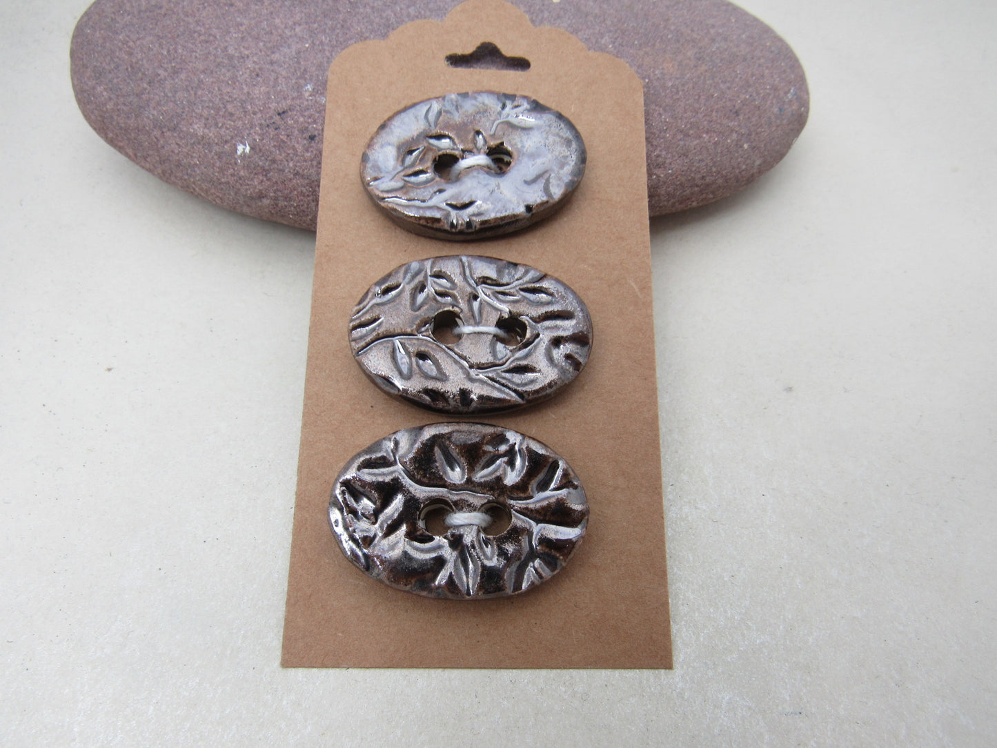 Trio of Medium Oval Sprig Pattern Ceramic Buttons