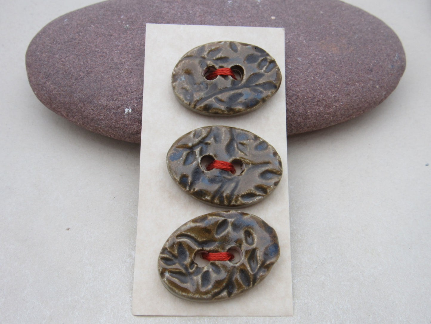 Trio of Medium Oval Sprig Pattern Ceramic Buttons