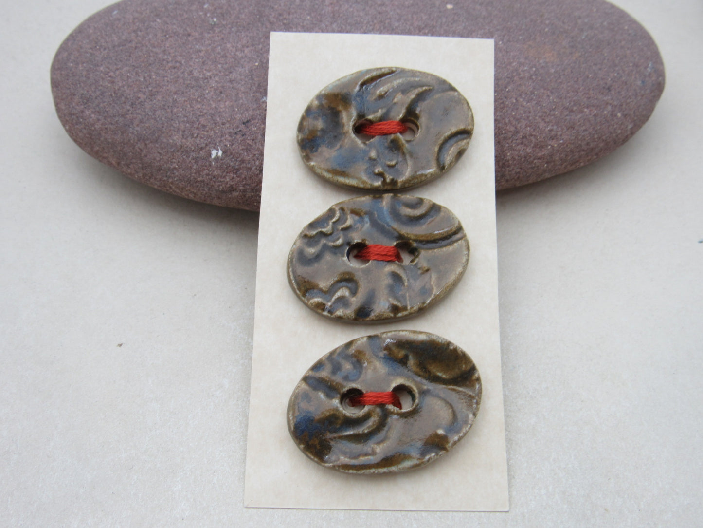 Trio of Medium Oval Brocade Pattern Buttons