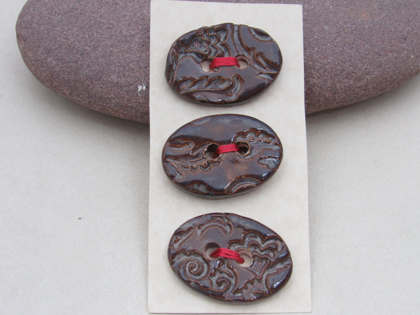 Trio of Medium Oval Brocade Pattern Buttons