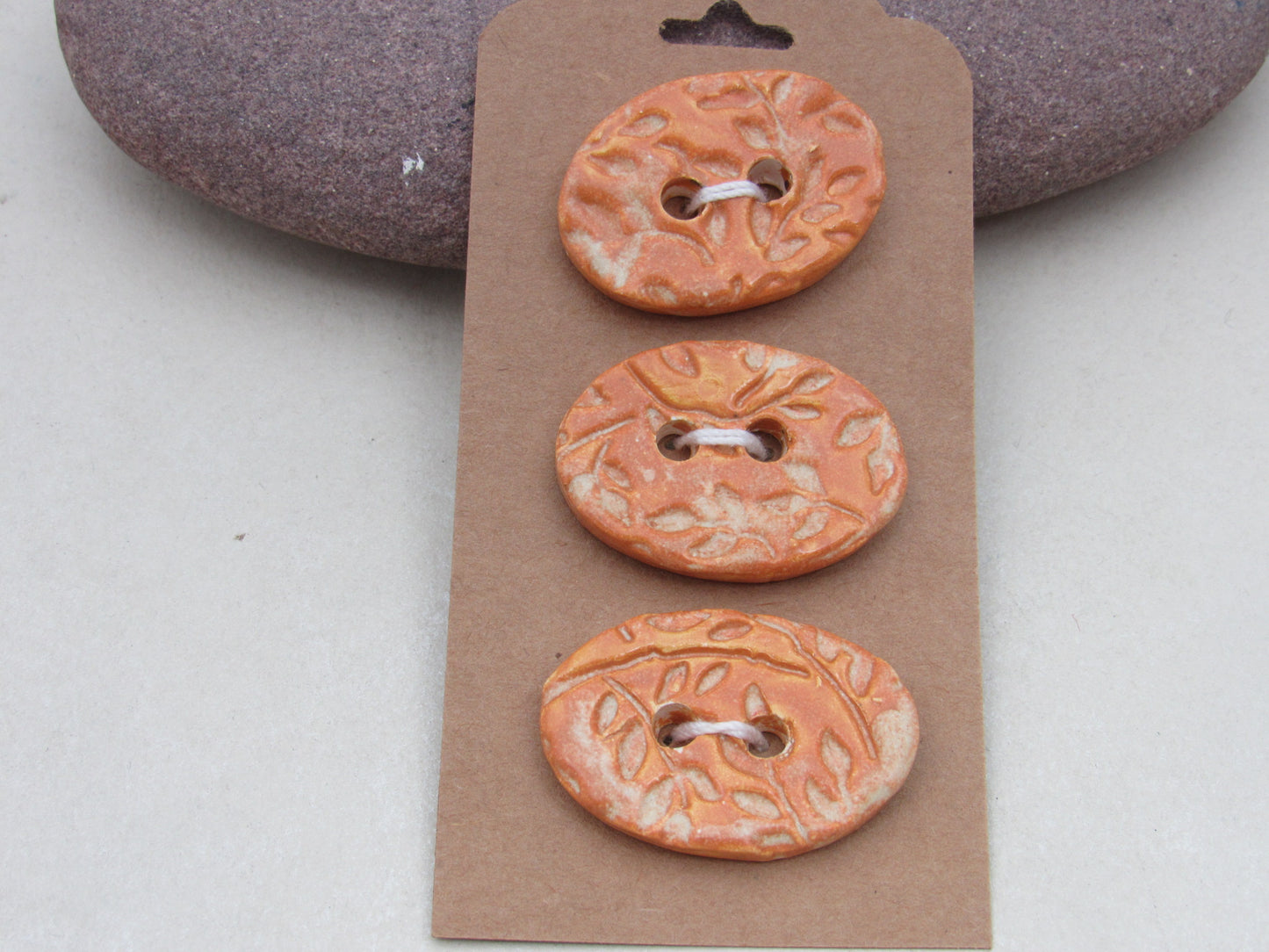 Trio of Medium Oval Sprig Pattern Ceramic Buttons