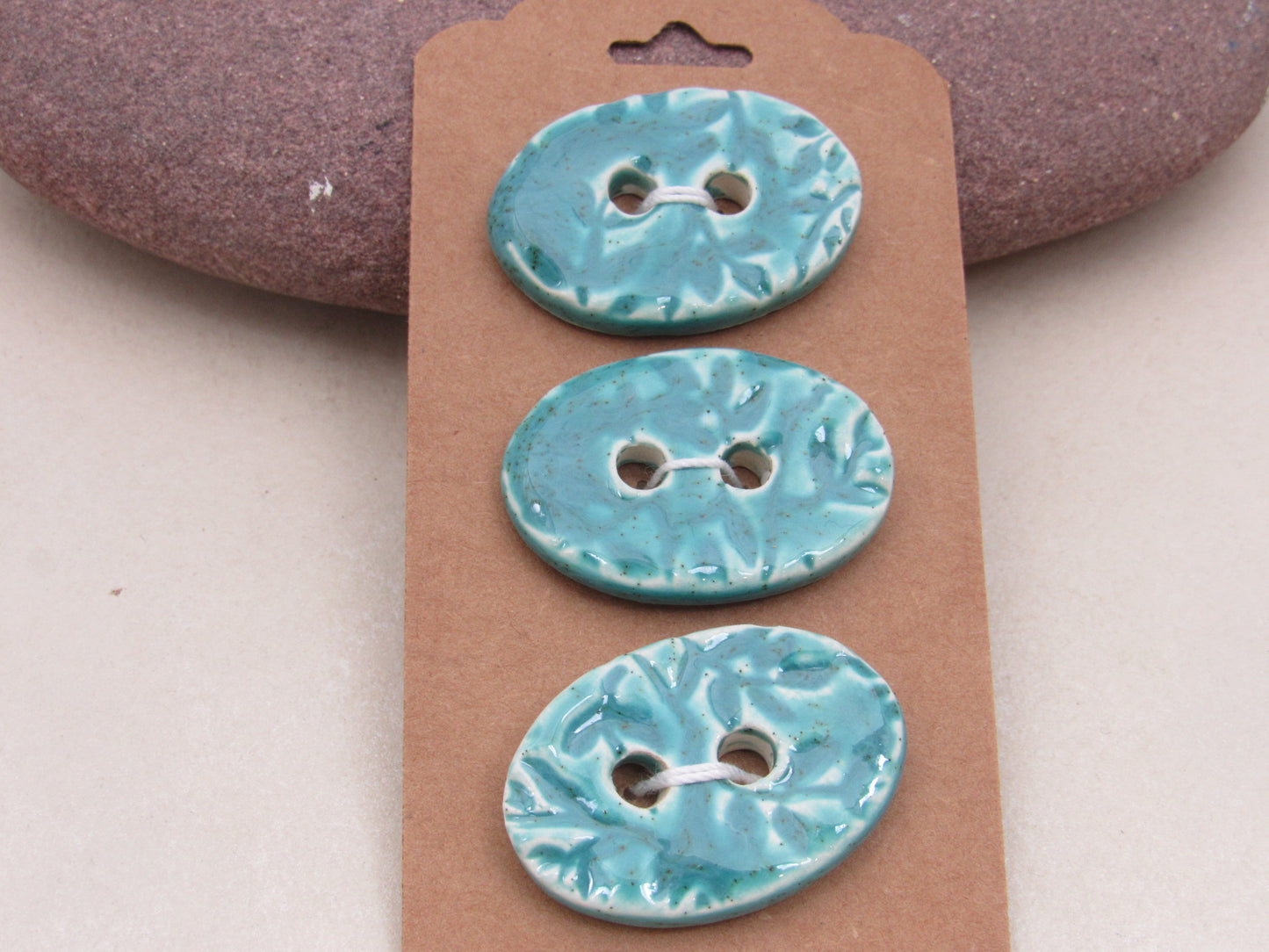 Trio of Medium Oval Sprig Pattern Ceramic Buttons
