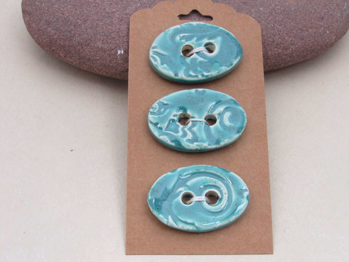 Trio of Medium Oval Brocade Pattern Buttons