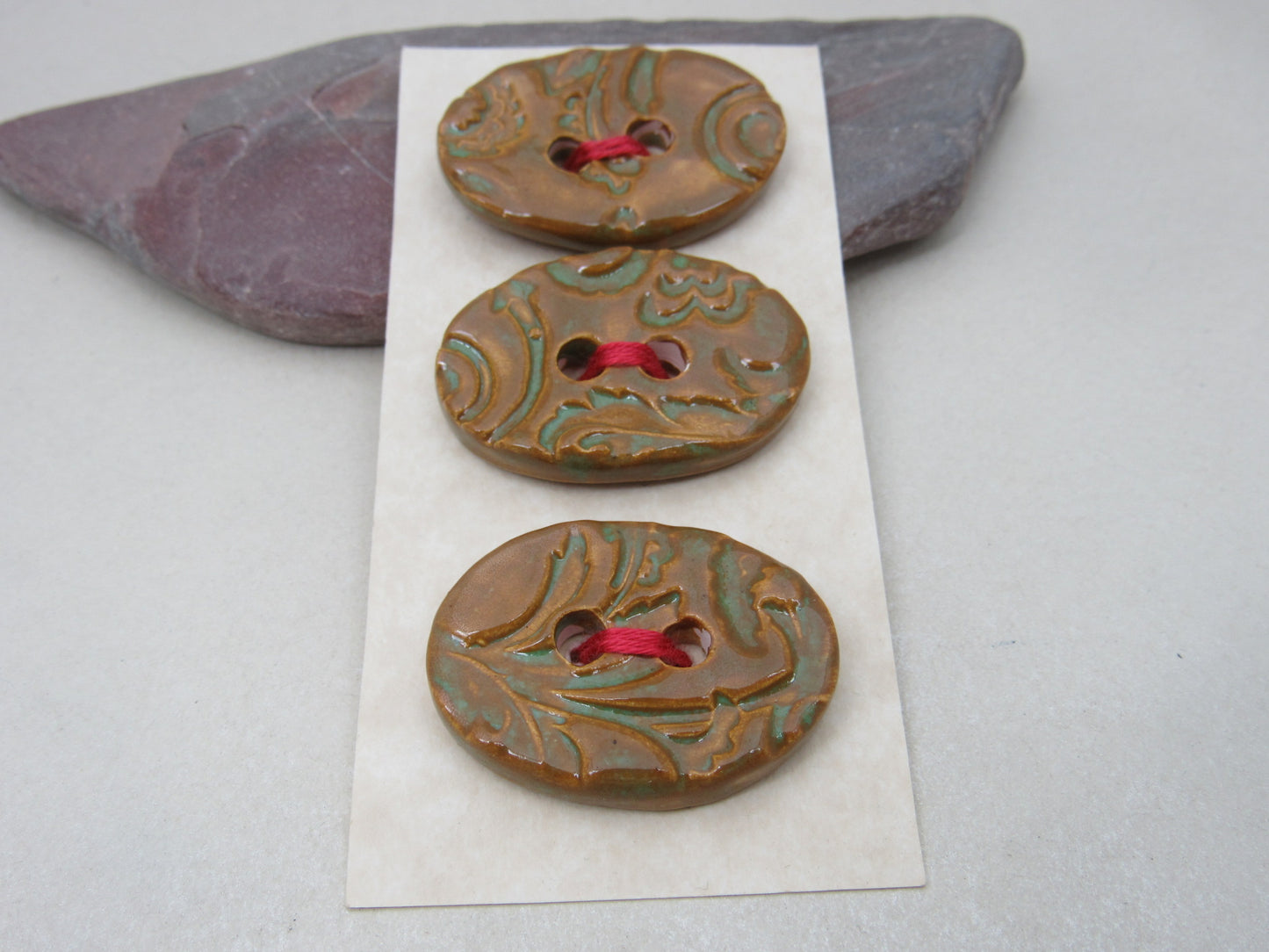 Trio of Medium Oval Brocade Pattern Buttons
