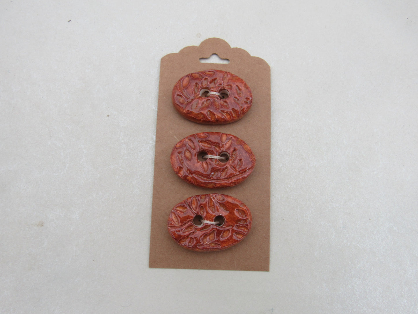 Wholesale Trio Medium Sprig Texture Oval Ceramic Buttons