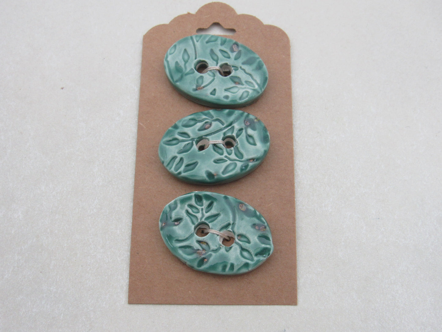 Wholesale Trio Medium Sprig Texture Oval Ceramic Buttons