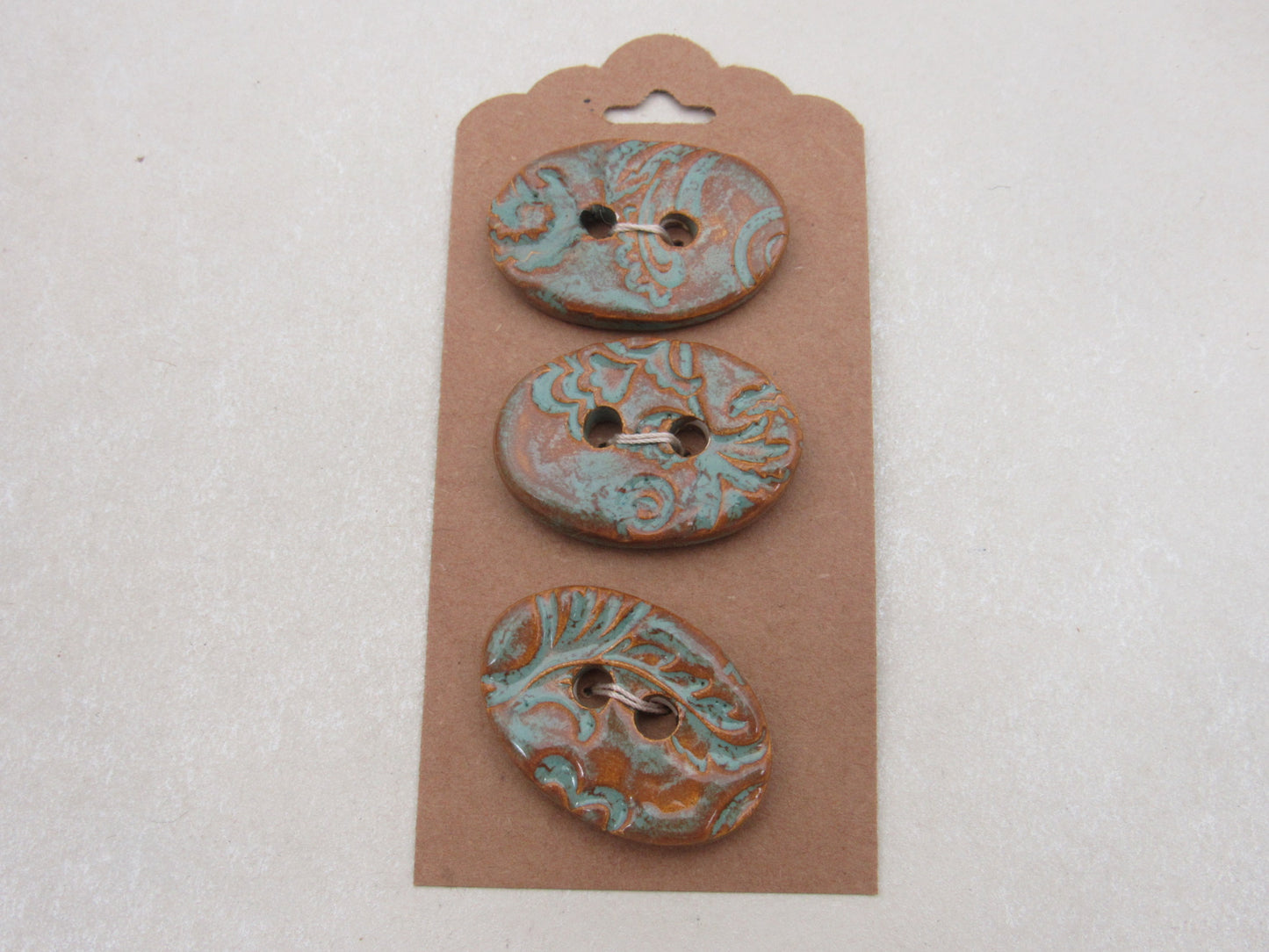 Wholesale Trio Medium Brocade Texture Oval Ceramic Buttons