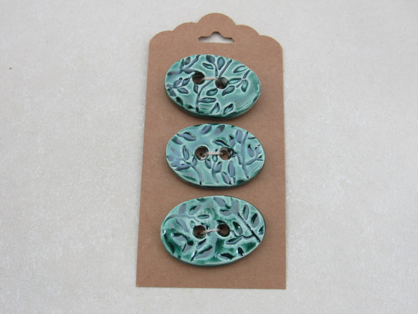 Wholesale Trio Medium Sprig Texture Oval Ceramic Buttons