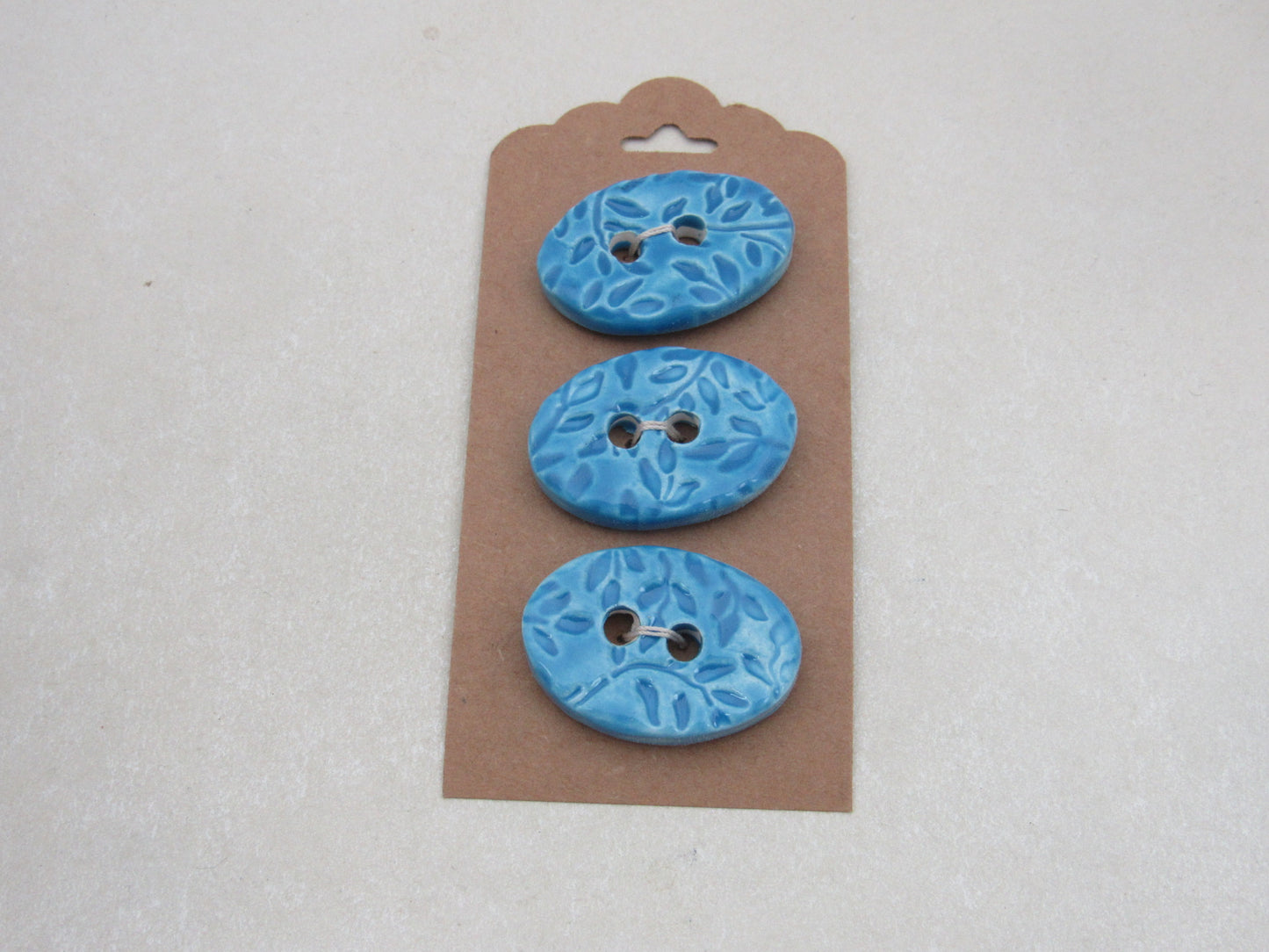 Wholesale Trio Medium Sprig Texture Oval Ceramic Buttons