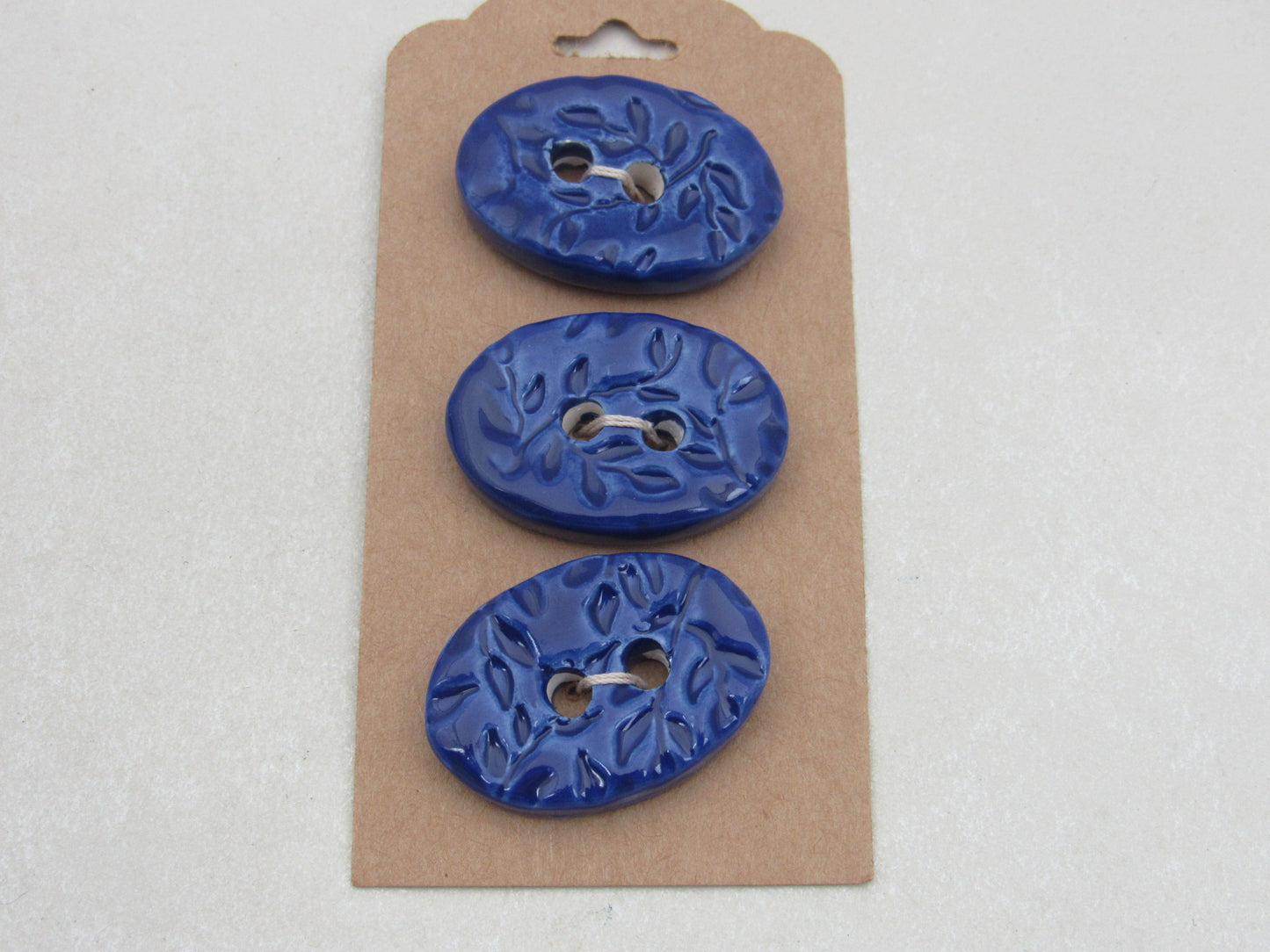 Wholesale Trio Medium Sprig Texture Oval Ceramic Buttons