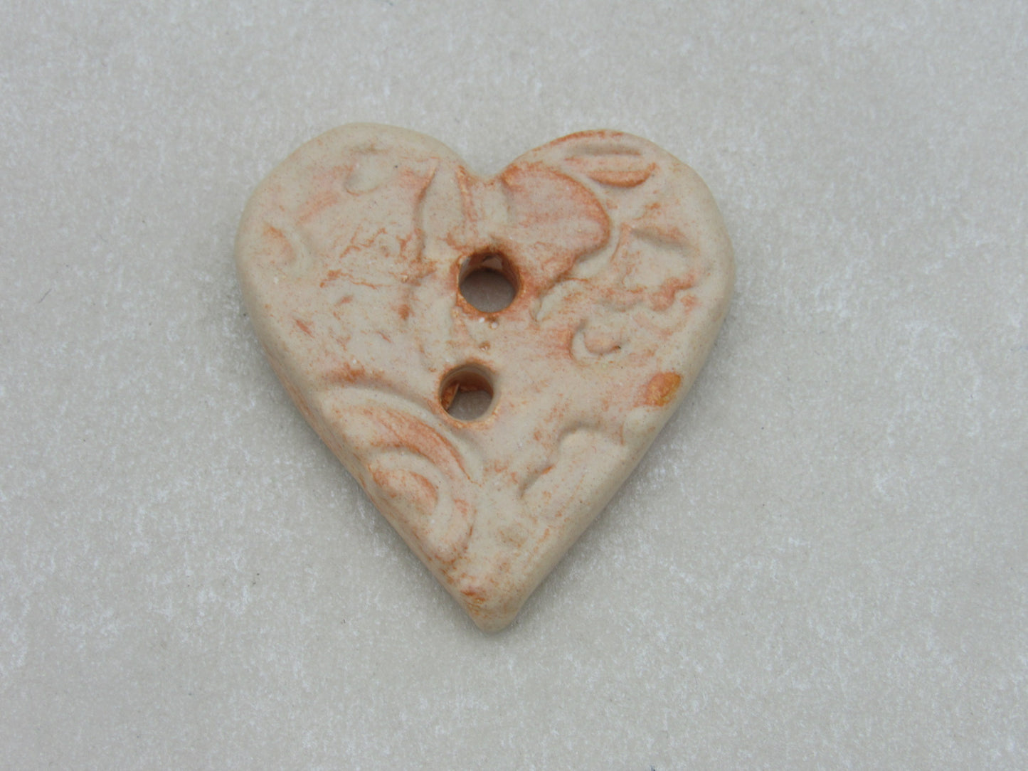 Wholesale Single Medium Brocade Texture Heart Shaped Ceramic Button