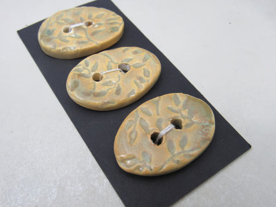 Trio of Medium Oval Sprig Pattern Ceramic Buttons