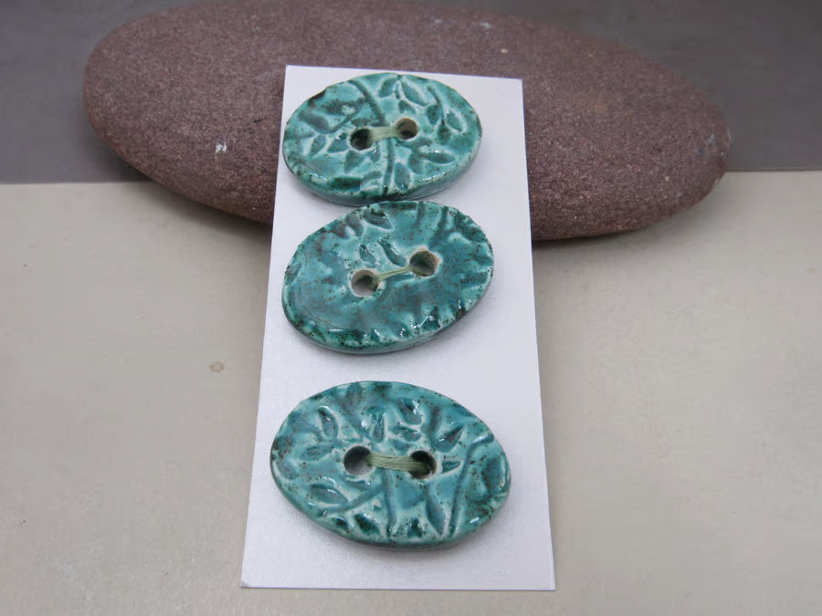 Trio of Medium Oval Sprig Pattern Ceramic Buttons