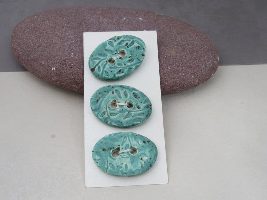 Trio of Medium Oval Sprig Pattern Ceramic Buttons