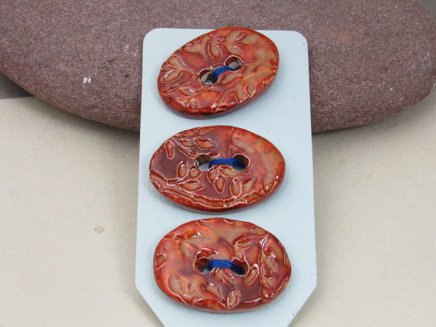 Trio of Medium Oval Sprig Pattern Ceramic Buttons