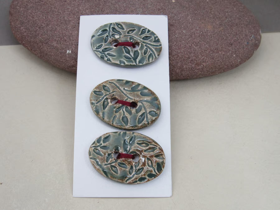 Trio of Medium Oval Sprig Pattern Ceramic Buttons